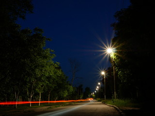 Polonne / Ukraine - 22 May 2018: street lights with light from cars at night