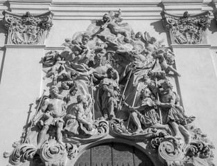 PRAGUE, CZECH REPUBLIC - OCTOBER 18, 2018: Baroque relief of apostle St. James the Grater over the main entry  of  Bazilika Svatého Jakuba Většího (James the Greater) by Ottavio Mosto (1695 -1701).