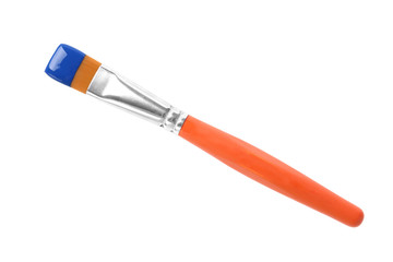 Brush with color paint on white background, top view