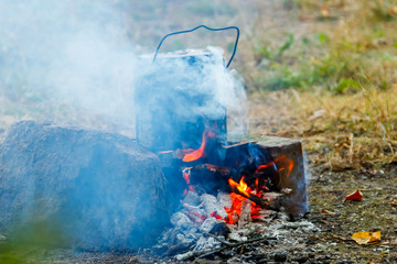 Cooking on campfire in camping