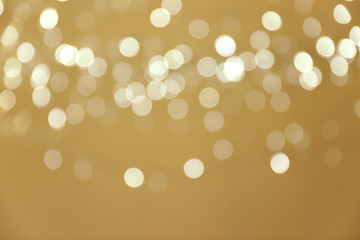 Blurred view of shiny silver lights. Bokeh effect