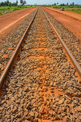 A newly laid section of rail track between Kamsar and Sangaredi in the west of the Guinea for the delivery of bauxite by train shuttle.