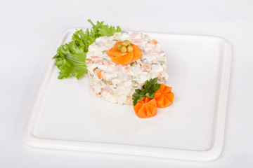  delicious Russian fresh salad with greens, on the table for use in culinary design