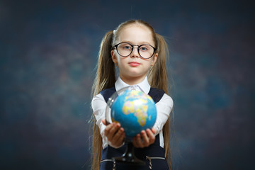 Blonde Little Schoolgirl Hold World Globe in Hand