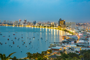 Cityscape Pattaya beach, the most popular on summer, landmark in Thailand, Aerial view. Travel background is lighting & living on the beach and Bali Hai Pier. © joelia