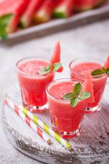 Glasses of watermelon smoothie with mint