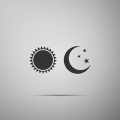 Sun and moon icon isolated on grey background. Weather daytime and night. Flat design. Vector Illustration