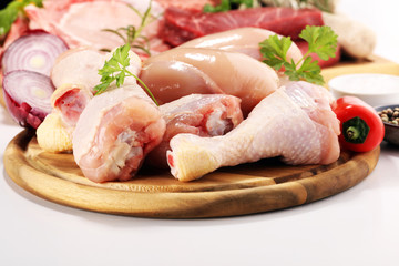 raw meat. Different types of raw pork meat, chicken and beef with spices and herbs