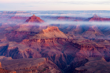 Sunrise Image of the Grand Canyon National Park with early morning haze and fog, Arizona, USA
