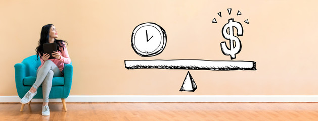 Time and money on the scale with young woman holding a tablet computer in a chair