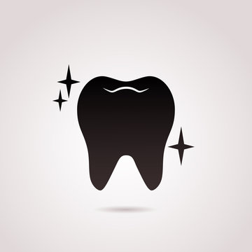 Shiny, healthy tooth vector icon.