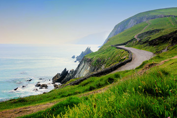 Road along the scenic coast of western Ireland. Slea Head, Dingle peninsula, County Kerry.
