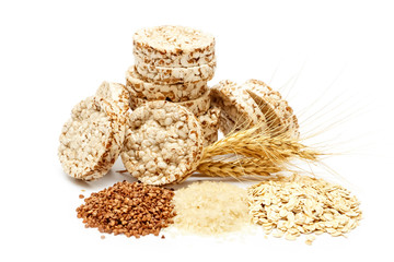 Crispy crispbread with buckwheat, rice and oatmeal isolated on white background. Crisp dietary fitness bread. Food for weight loss.