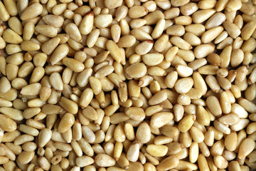 A close up of Pine nuts for background whole food texture