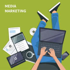 Media marketing and advertising concept. Man sitting on the floor and holding lap top in his lap, doing his advertising job. Flat vector illustration.