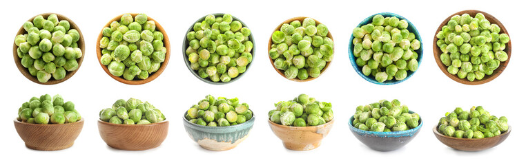 Set of different bowls with fresh Brussels sprouts on white background