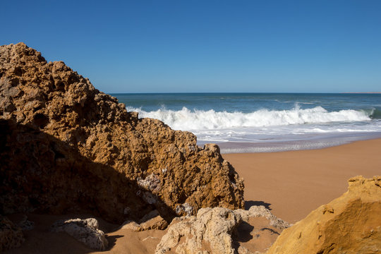 Rocks on the sandy beach, Lalla Fatna, Morocco