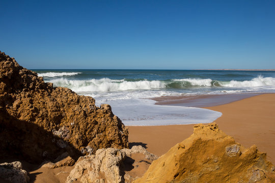 Rocks on the sandy beach, Lalla Fatna, Morocco