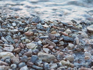 Sea stones and waves background.