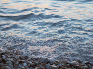 Sea stones and waves background.