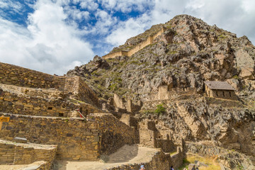 View of inca archaeological site with the Sun Temple, Ollantaytambo, Peru