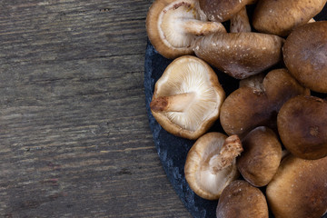 shitake mushrooms ready to be cooked with greens