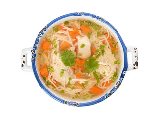Dish with fresh homemade chicken soup on white background, top view