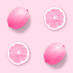A minimalist design with a dyed pink lemon. Creative summer concept. Creative summer concept. Flat lay.Top view.