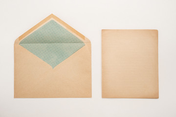 Old envelope and paper on white background