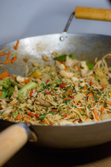 Chicken wok in pan ready to be eaten..​