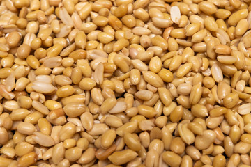 Washed grains of peeled peanuts ready for frying