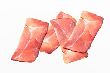 Hamon sliced on white background. Spanisch traditional meat.