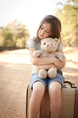 Little Girl with Ragged Teddybear and Suitcase - Poverty, Homelessness, Runaway Child