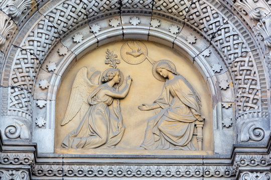 PRAGUE, CZECH REPUBLIC - OCTOBER 17, 2018: The relief of Annunciation on the portal of the church kostel Svatého Cyrila Metodeje by Václav Levý (1867 - 1869)