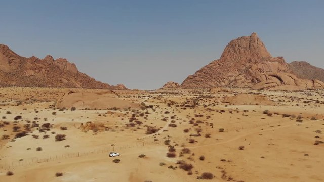 Arid desert landscape of Spitzkoppe mountain in Central Namibia, Aerial drone shot