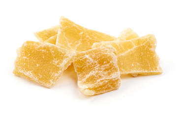 Dried candied ginger, close-up, isolated on white background
