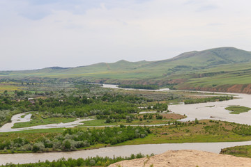 View on the Kura river and Caucasus mountains from Ancient cave city Uplistsikhe, Georgia