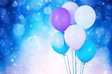 Bunch of colorful balloons on background