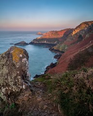 Jersey north coast at sunset, L'Etacquerel Fort and White Rock