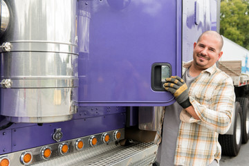 Truck driver and purple semi-truck