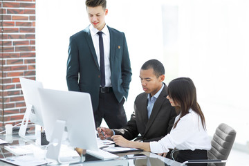 business team working with documents in a modern office.