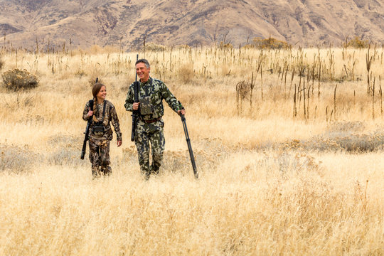 Man hunting with his granddaughter