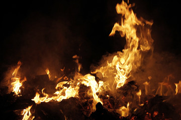 Industrial garbage burning at night time close up