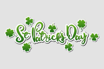 St. Patrick's Day Vector Green  text lettering isolated illustration with clover on grey background  