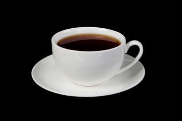 White cup with tea on a black isolated background
