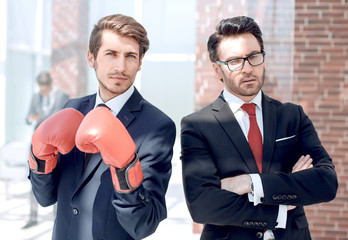 two confident businessman standing in the office