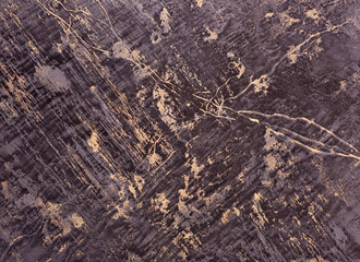 Fototapeta na wymiar abstract interior design handmade wall background design, dark granite with gold deposits in it and mix with gold, gray handmade wall