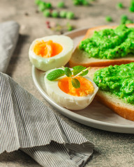 green peas, avocado and vegetable pate - sandwich (healthy breakfast). food concept. top view
