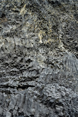 Basalt volcanic rock formations in Reinisfjara beach near Vik in northern Iceland