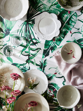 Plates on Floral Wallpaper with Petals